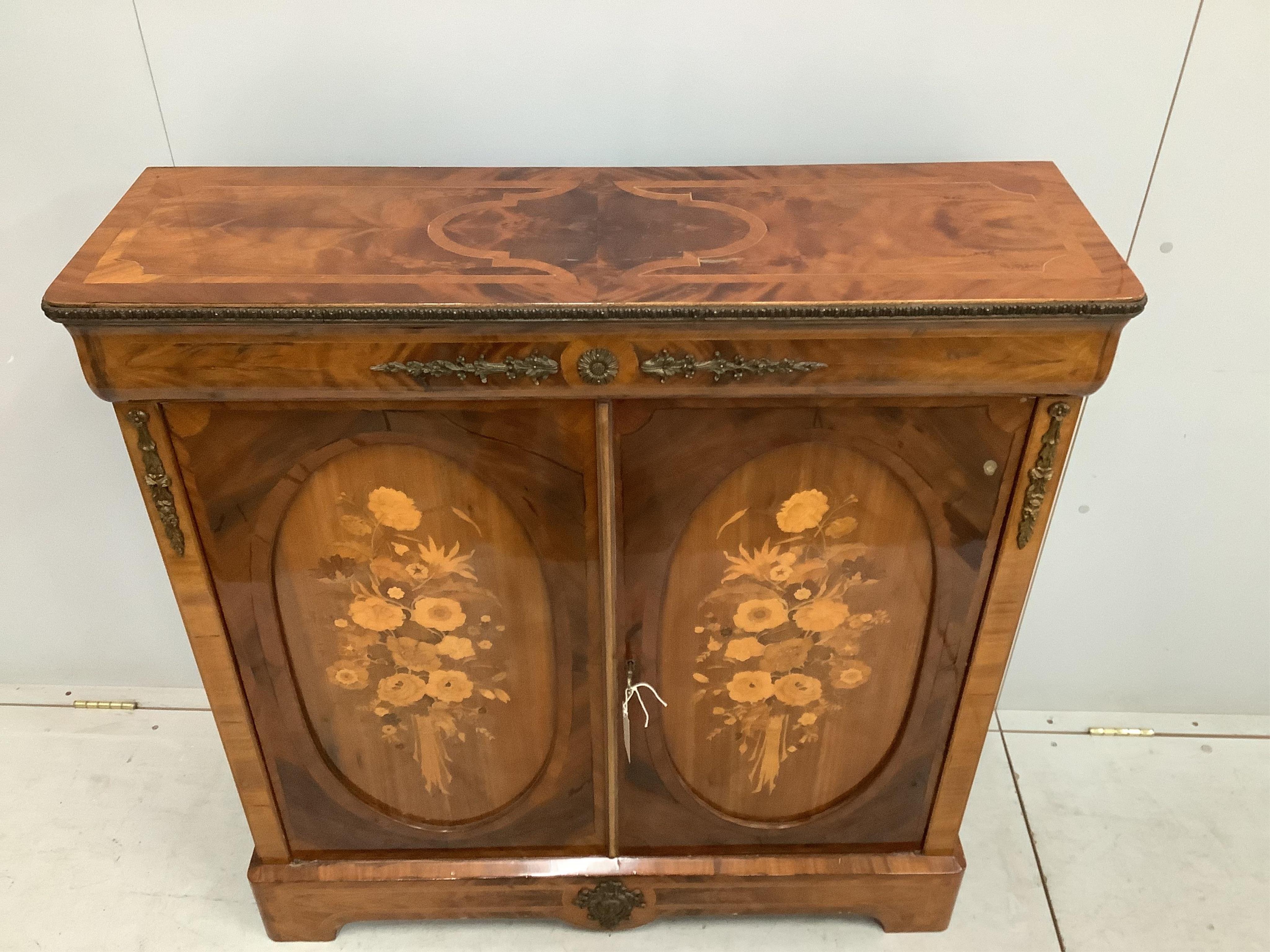 A gilt metal mounted cross banded and marquetry inlaid side cabinet, width 101cm, depth 31cm, height 105cm. Condition - fair